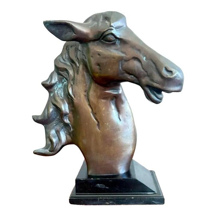 Vintage Bronze Horse Head Sculpture on Black Plinth: Vintage Bronze Horse Head Sculpture on Black Plinth This stunning late 20th century vintage horse statue is a bronze head sculpture that showcases a strong, elongated form with intricate detailing in 