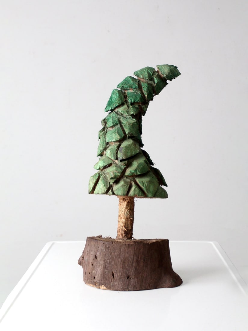 Vintage Hand-Carved Pine Tree Sculpture Rustic Folk Art: Vintage Hand-Carved Pine Tree Sculpture Rustic Folk Art Enhance your home decor with this vintage hand-carved folk art pine tree sculpture, a perfect blend of rustic charm and handcrafted elegance. Cr