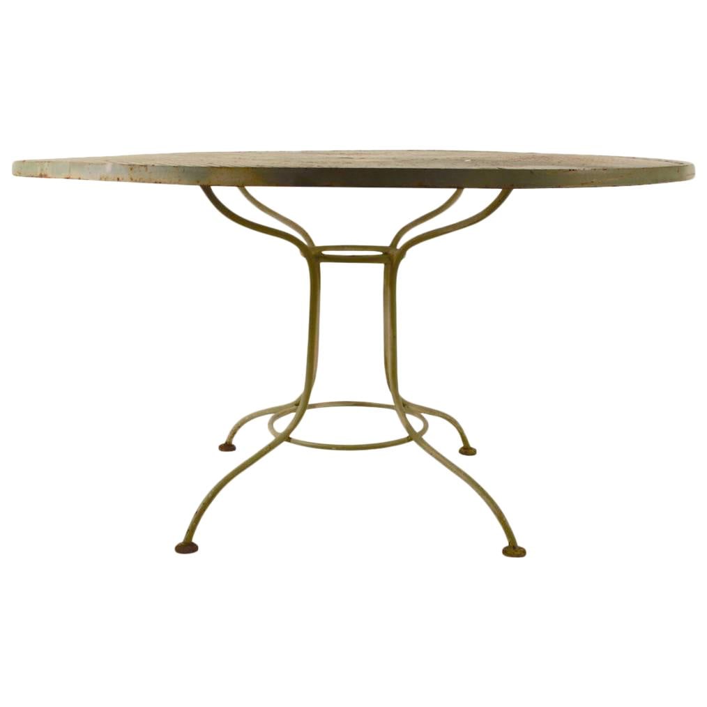 1950s Vintage Gray Metal Round Mesh Top Garden Table: 1950s Vintage Gray Metal Round Mesh Top Garden Table This vintage round garden table from the 1950s features a durable metal mesh top supported by a sturdy tubular frame, making it perfect for both in