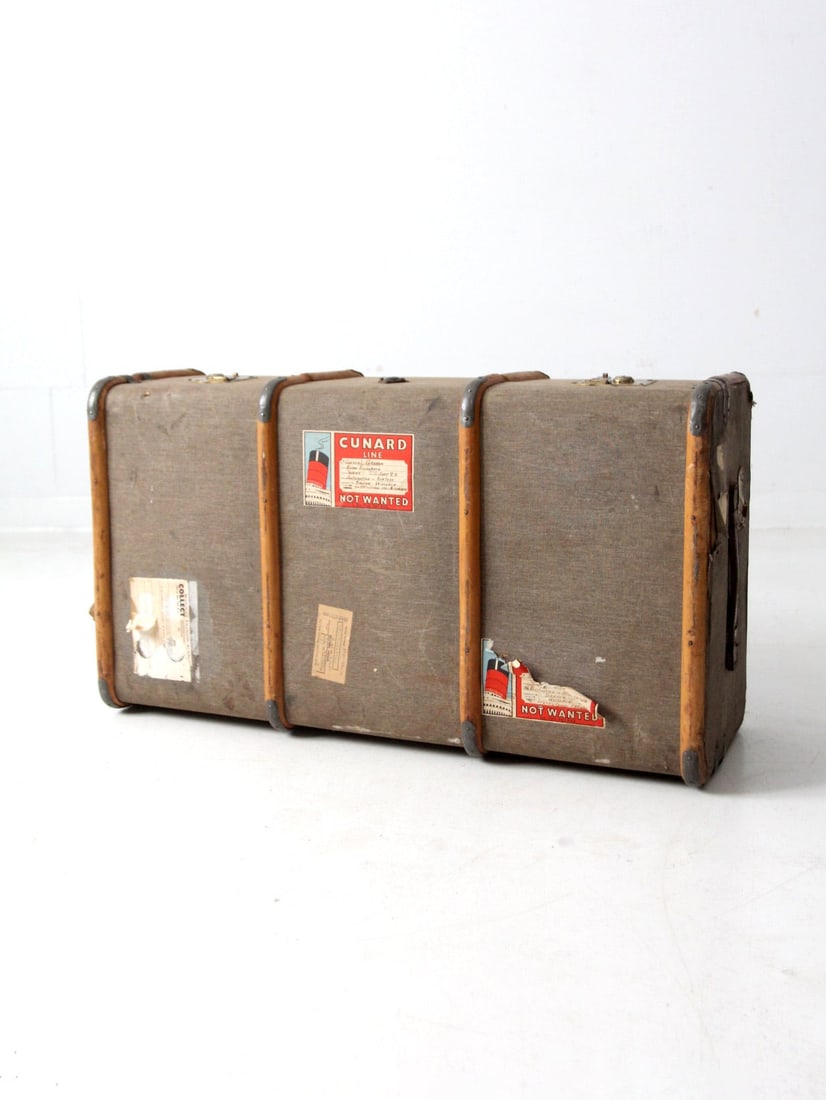 Vintage 1950s Cunard Line Steamer Trunk Travel Relic: Vintage 1950s Cunard Line Steamer Trunk Travel Relic This vintage 1950s Cunard Line steamer trunk is a classic piece of travel history, showcasing original Cunard Line and transit labels. Its robust d