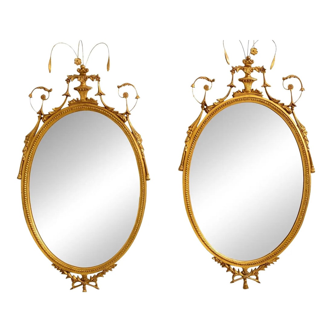Quality Pair of Adam Style Gold Mirrors by Carvers Guild: Quality Pair of Adam Style Gold Mirrors by Carvers Guild This exquisite pair of Adam Style gold mirrors showcases a remarkable craftsmanship that reflects quality construction. Each mirror features or