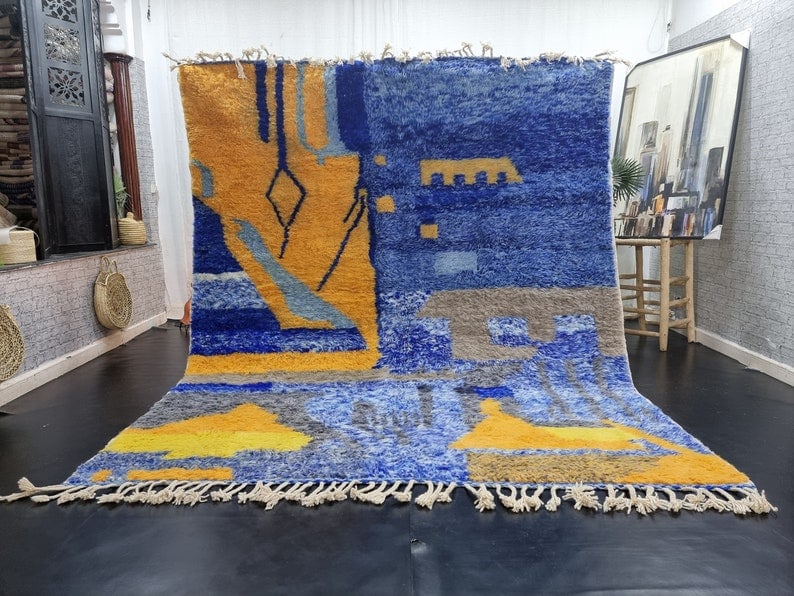 Authentic Colorful Moroccan Berber Wool Rug 9.84 x 6.56 Feet: Authentic Colorful Moroccan Berber Wool Rug 9.84 x 6.56 Feet Discover the elegance of this authentic handwoven Moroccan Berber wool rug. Crafted by skilled local Berber women weavers in the Atlas moun
