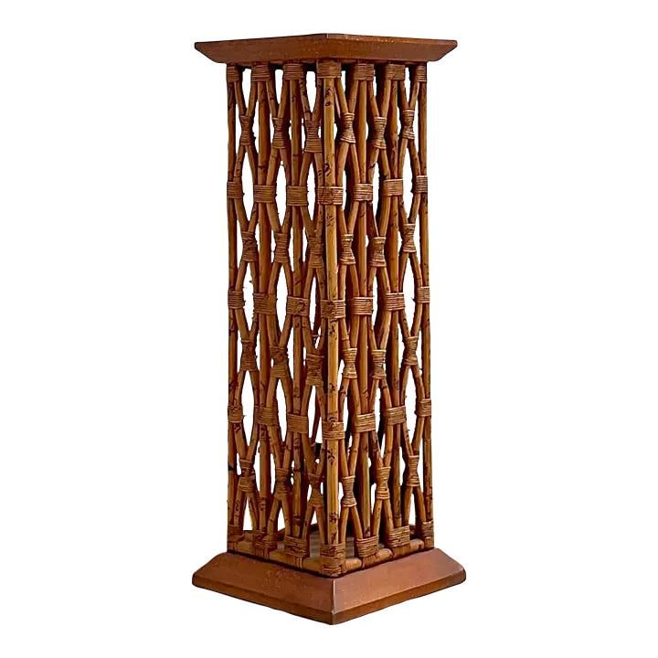 Vintage Coastal Rattan Pedestal with Trellis Design 42": Vintage Coastal Rattan Pedestal with Trellis Design 42" This stunning vintage Coastal trellis pedestal features an exquisite rattan design complemented by a faux finished plinth and top. Originally ac