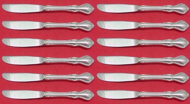 Reed & Barton Hampton Court Sterling Silver Butter Spreader Set 12 pcs: Reed & Barton Hampton Court Sterling Silver Butter Spreader Set 12 pcs This elegant set of 12 butter spreaders features the Hampton Court pattern by Reed & Barton, crafted from high-quality sterling s