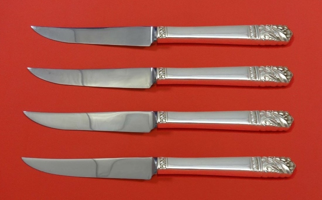 Oneida Mansion House Sterling Silver Steak Knife Set 4pc 8 1/2": Oneida Mansion House Sterling Silver Steak Knife Set 4pc 8 1/2" Enhance your dining experience with this exquisite Mansion House by Oneida Sterling Silver Steak Knife Set. This 4-piece set features ho