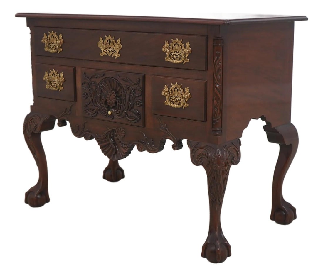 Mahogany Lowboy with Ball and Claw Feet Winterthur Collection Chippendale Style: Mahogany Lowboy with Ball and Claw Feet Winterthur Collection Chippendale Style This mahogany lowboy from the Kindel Winterthur Collection showcases classic 18th-century Chippendale styling with fine 
