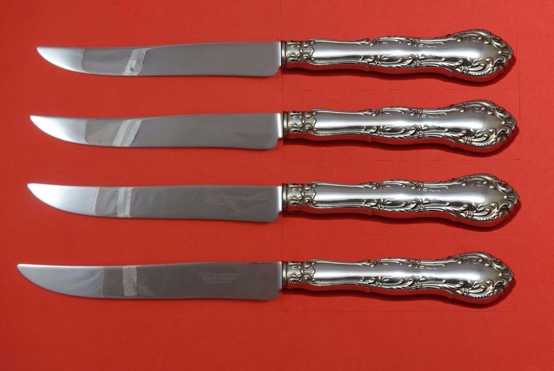 Old Atlanta Wallace Sterling Silver 4pc Texas Sized Steak Knife Set: Old Atlanta Wallace Sterling Silver 4pc Texas Sized Steak Knife Set Elevate your dining experience with the Old Atlanta by Wallace Sterling Silver Steak Knife Set. This impressive 4-piece set features