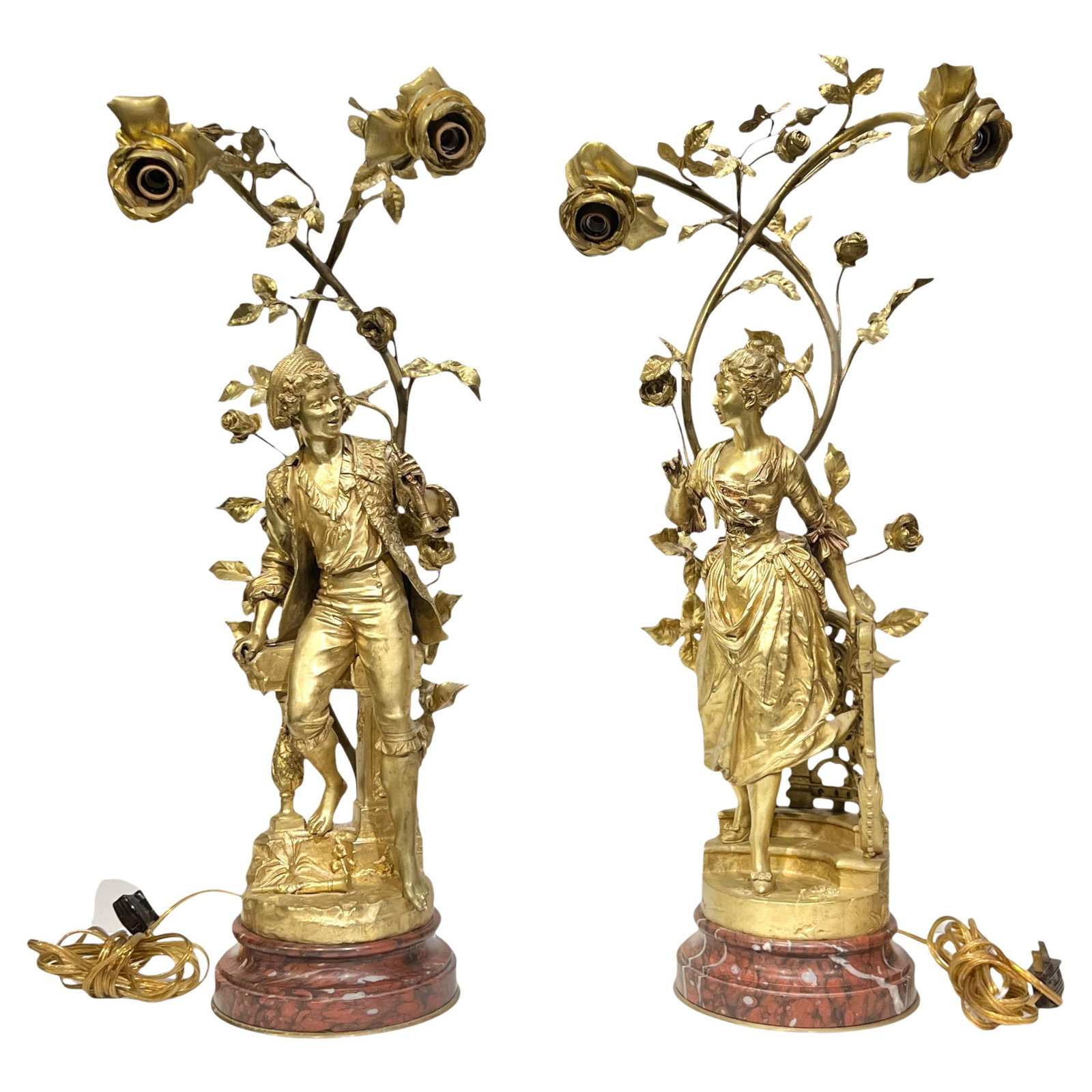 Set of 2 Art Nouveau Gilt Bronze Figural Candelabra Lamps on Rouge Marble Bases: Set of 2 Art Nouveau Gilt Bronze Figural Candelabra Lamps on Rouge Marble Bases This pair of antique table lamps features figural designs of a joyful young man and woman with rose flowers, crafted in 