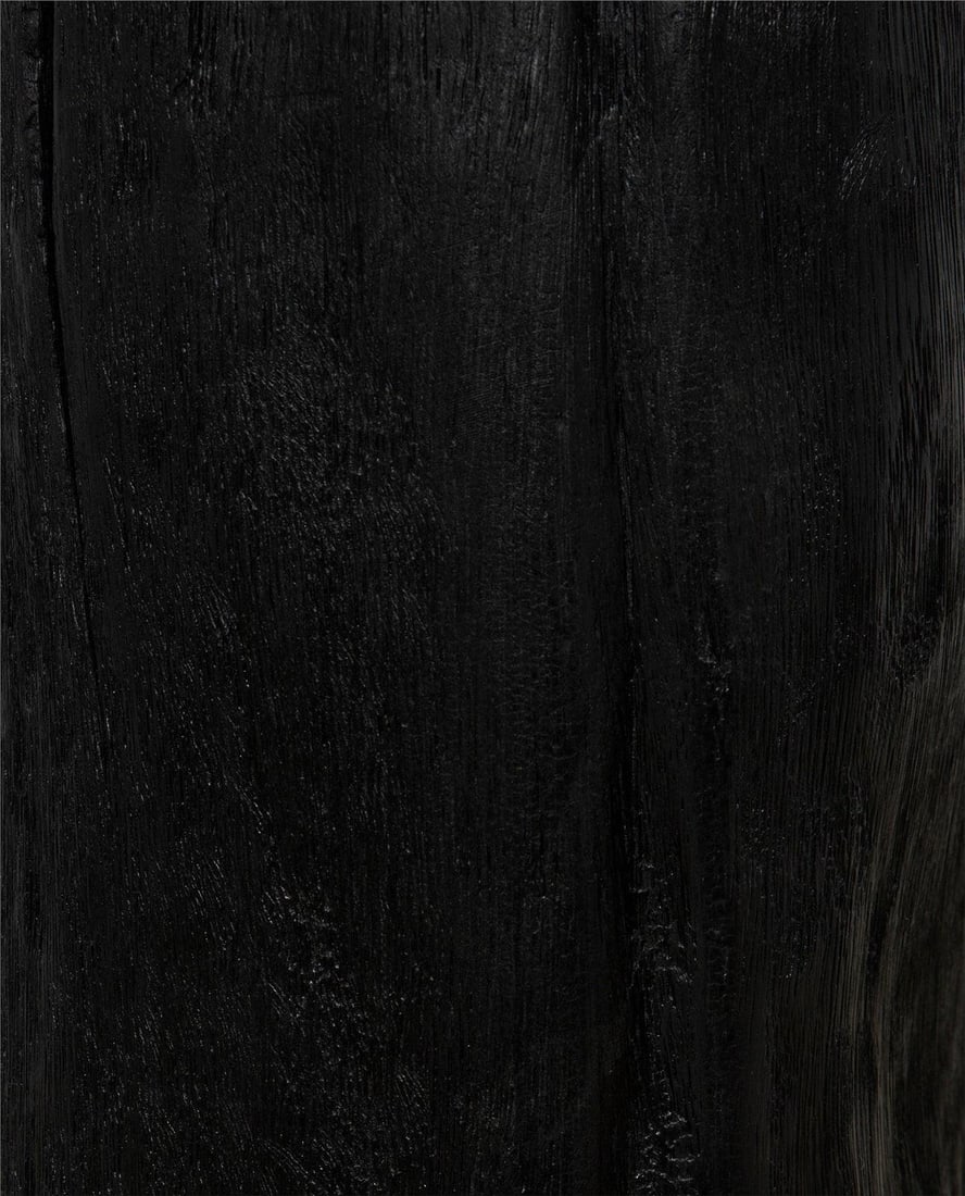 Noir Budi Collection Burnt Black Munggur Wood Side Table: Noir Budi Collection Burnt Black Munggur Wood Side Table This elegant side table features a striking design crafted from durable Munggur wood, showcasing a burnt black finish that adds a touch of