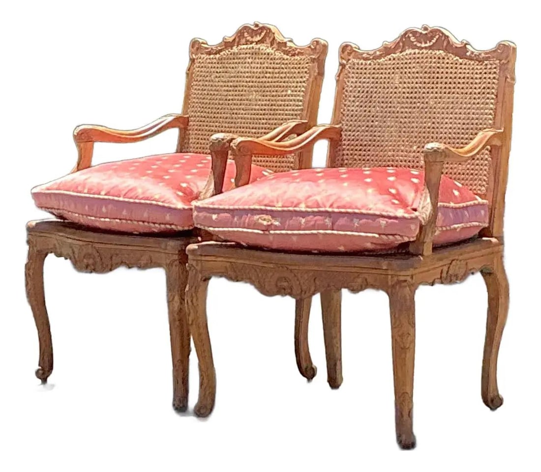 Pair of Vintage Regency French Cane Fauteuils Elegant Design: Pair of Vintage Regency French Cane Fauteuils Elegant Design Experience the allure of French design with this exquisite pair of Vintage Regency French Cane Fauteuils. These armchairs feature beautiful
