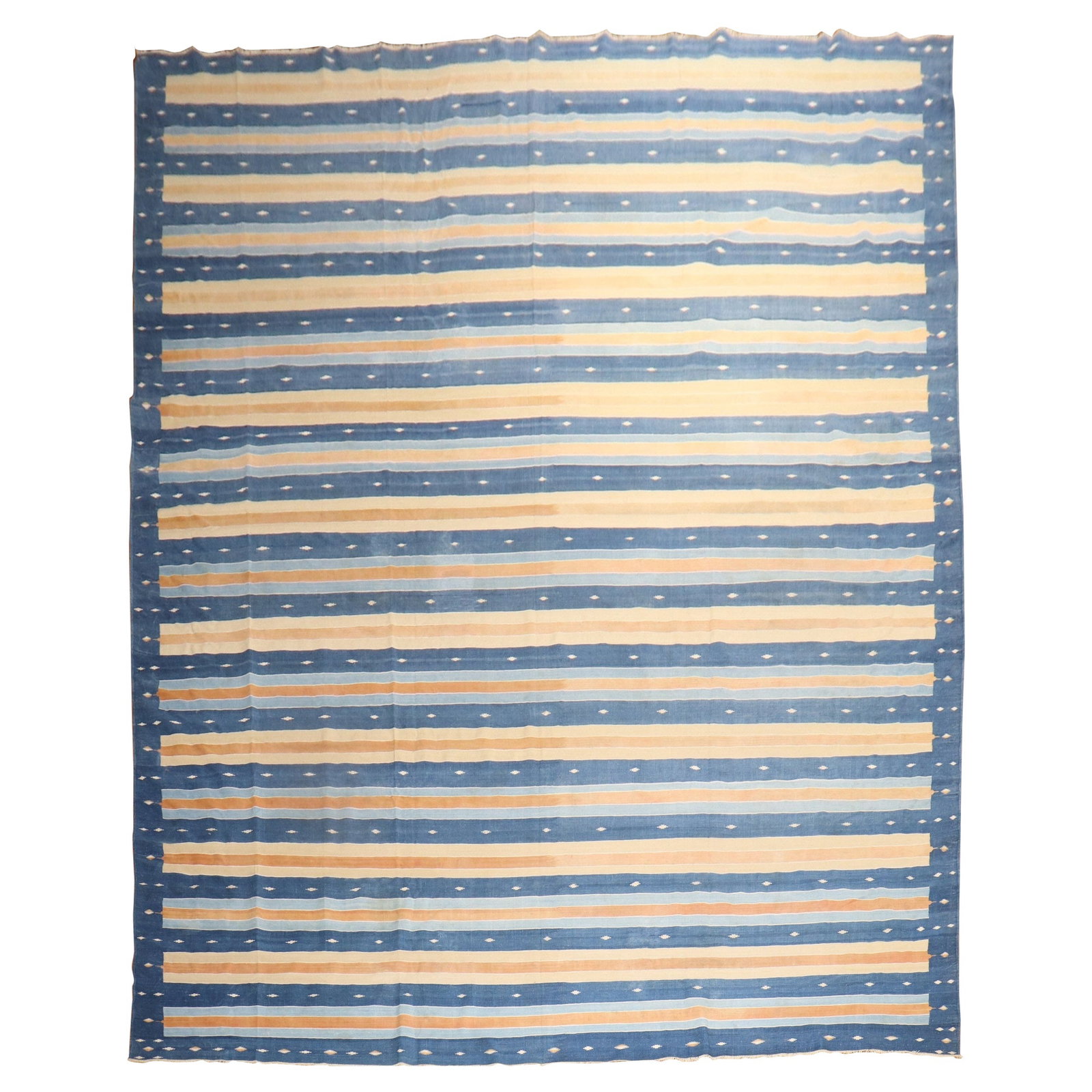 Early 20th Century Indian Dhurrie Kilim Rug 10'5" x 14'7": Early 20th Century Indian Dhurrie Kilim Rug 10'5" x 14'7" Discover the beauty of this early 20th century Indian Dhurrie rug, expertly woven with a blend of cotton and wool. This large room-size carpet