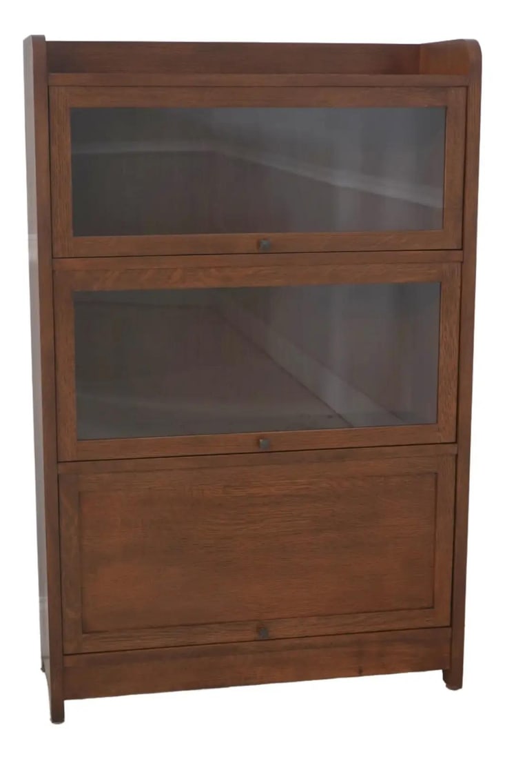 Mission Style Oak Barrister Bookcase with Three Graduated Tiers and Glass Doors: Mission Style Oak Barrister Bookcase with Three Graduated Tiers and Glass Doors This Stickley Mission Oak barrister bookcase features three graduated sections with individual pane glass doors and retr