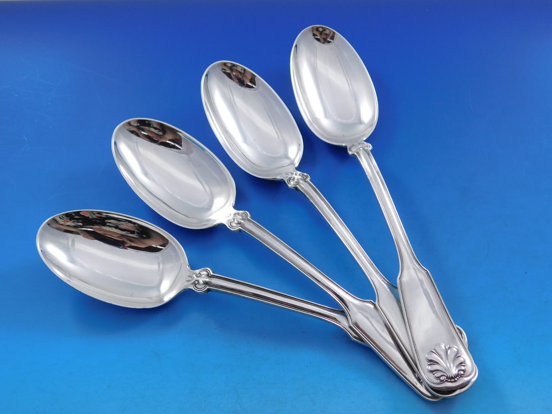 Tiffany & Co Shell & Thread Sterling Silver Serving Spoon Set of 4: Tiffany & Co Shell & Thread Sterling Silver Serving Spoon Set of 4 Enhance your dining experience with this exquisite set of four serving spoons from Tiffany & Co. The Shell & Thread pattern, renowned