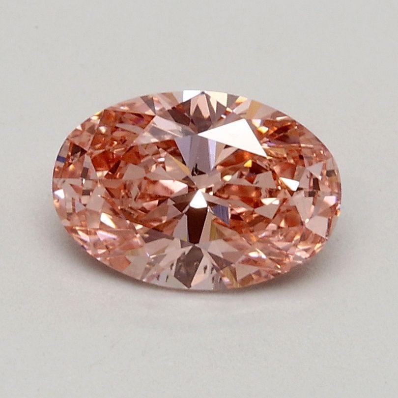 Loose Diamond - OVAL 0.7ct Fancy Intense Pink VS2: Loose Diamond - OVAL 0.7ct Fancy Intense Pink VS2 Source: This is a real non-mined Diamond that has been grown in a lab Shape: OVAL Carats: 0.7 Color: Fancy Intense Pink Certification: IGI Video: