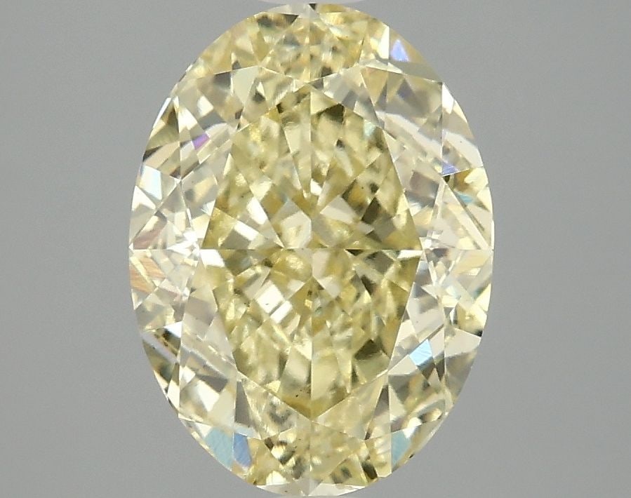 Loose Diamond - OVAL 3.1ct Fancy Vivid Yellow VS1: Loose Diamond - OVAL 3.1ct Fancy Vivid Yellow VS1 Source: This is a real non-mined Diamond that has been grown in a lab Shape: OVAL Carats: 3.1 Color: Fancy Vivid Yellow Certification: IGI Video: