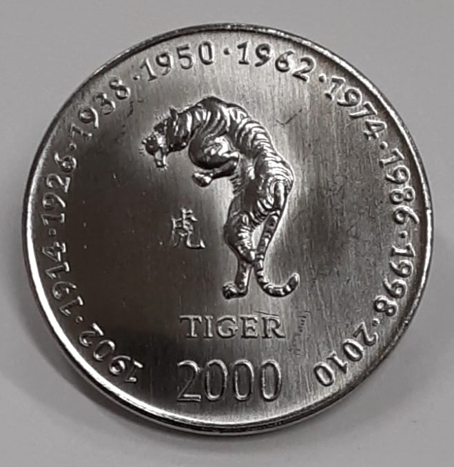 Roll of 30 Uncirculated 2000 Somalia 10 Shillings Tiger Lunar Coins KM 92: Roll of 30 Uncirculated 2000 Somalia 10 Shillings Tiger Lunar Coins KM 92 This is a roll of thirty un-used 2000 Somalia 10 Shillings coins featuring the Tiger design, classified as KM#92. These coins 