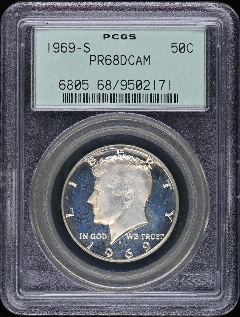 1969-S Kennedy Half Dollar Silver Clad PCGS PR68DCAM OGH: 1969-S Kennedy Half Dollar Silver Clad PCGS PR68DCAM OGH This 1969-S Kennedy Half Dollar is a stunning silver clad coin, certified by PCGS with a grade of PR68DCAM. Struck at the San Francisco mint, t