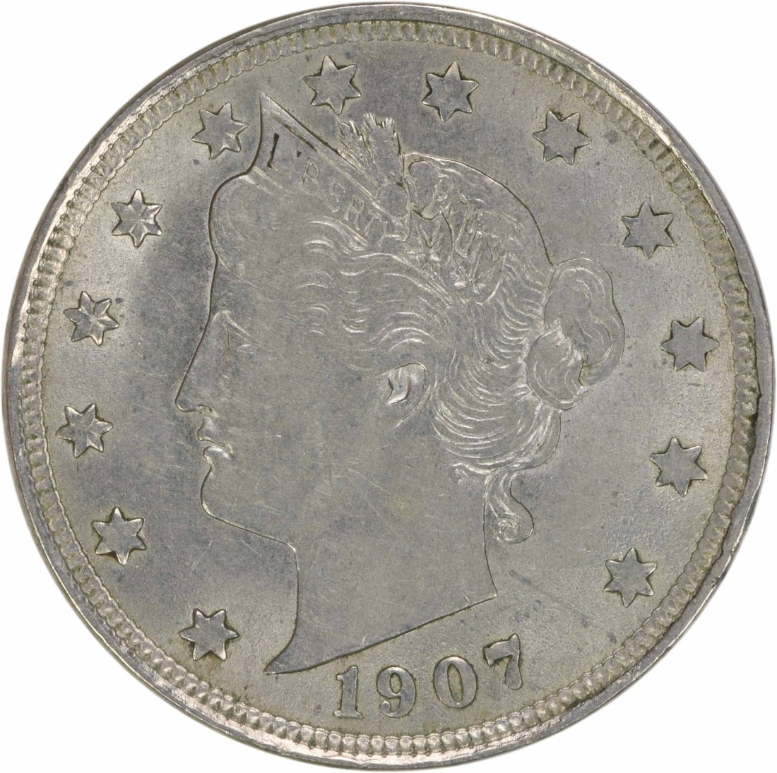 1907 Liberty Nickel 5C AU Uncertified Philadelphia Mint: 1907 Liberty Nickel 5C AU Uncertified Philadelphia Mint This 1907 Liberty Nickel is a remarkable piece of numismatic history, featuring a beautiful design by Charles E. Barber. The coin is circulated 