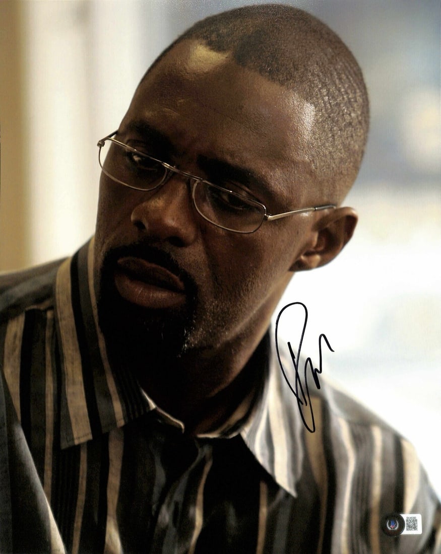 Idris Elba Signed 11x14 Photo Stringer Bell Beckett Certified: Idris Elba Signed 11x14 Photo Stringer Bell Beckett Certified This is an autographed 11x14 photograph of Idris Elba, best known for his role as "Stringer Bell" in the acclaimed TV series The Wire. The