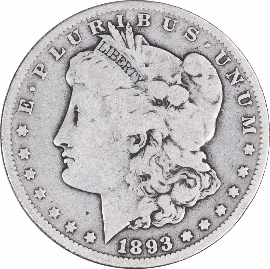1893-CC Morgan Silver Dollar VG Uncertified 90% Silver Coin: 1893-CC Morgan Silver Dollar VG Uncertified 90% Silver Coin This 1893-CC Morgan Silver Dollar is a historical coin that showcases the artistry of designer George T. Morgan. Struck at the Carson City M