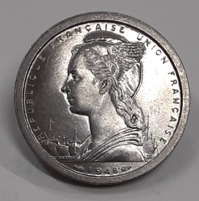 Roll of 35 Uncirculated 1948 Madagascar 2 Francs Aluminum Coins KM 4 in Wrapper: Roll of 35 Uncirculated 1948 Madagascar 2 Francs Aluminum Coins KM 4 in Wrapper This is a roll of 35 uncirculated 1948 Madagascar 2 Francs coins, composed of aluminum. Each coin is identified as KM#4 