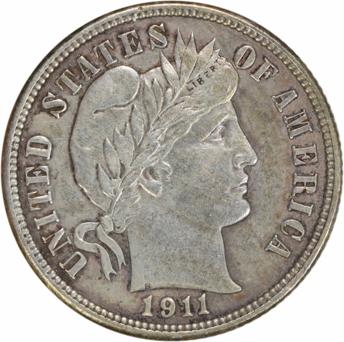 1911-D Barber Silver Dime AU Uncertified Coin 10C: 1911-D Barber Silver Dime AU Uncertified Coin 10C This 1911-D Barber Silver Dime is a remarkable piece of American numismatic history. Struck in Denver, this coin features the iconic design by Charles