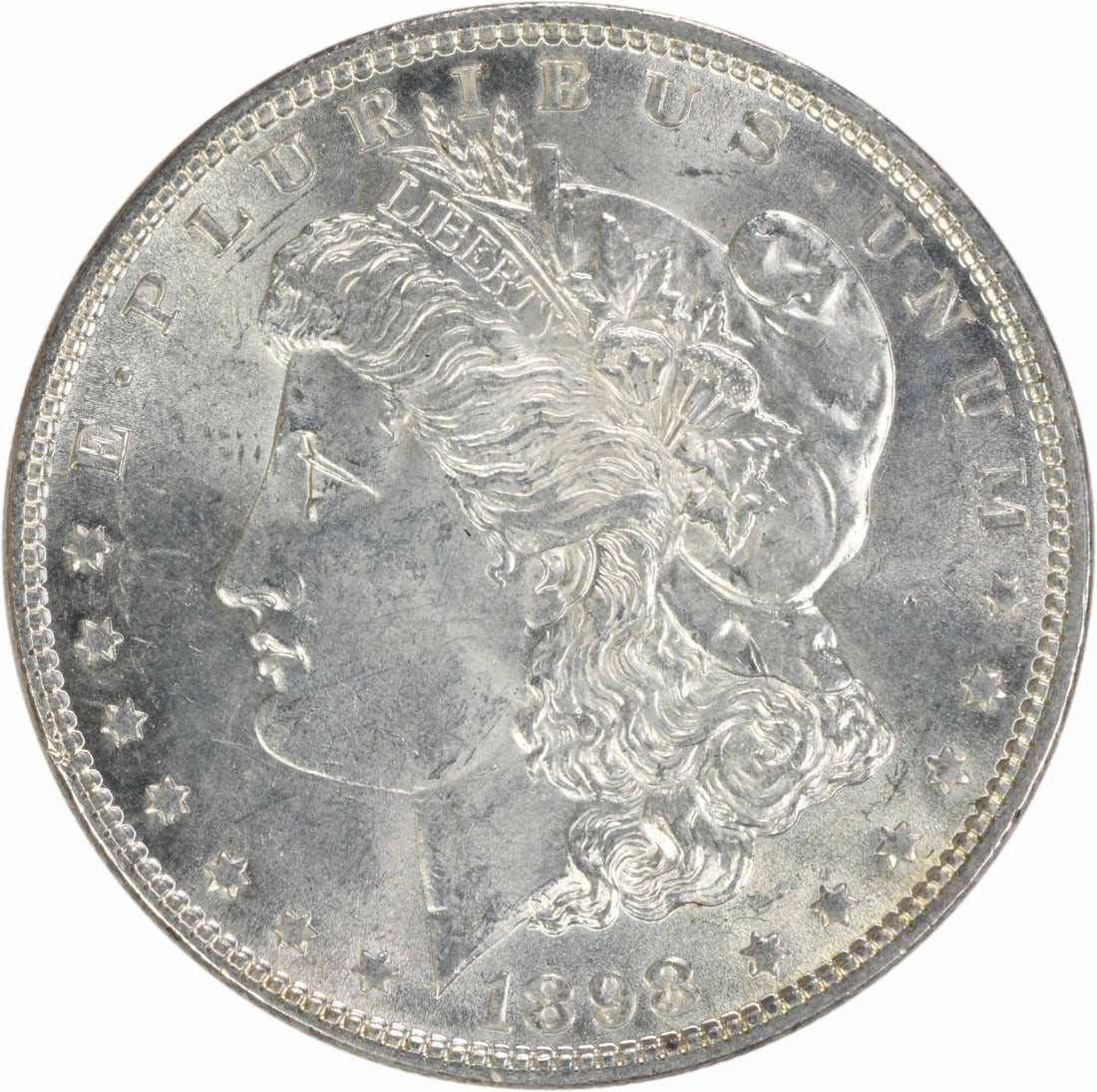 Choice BU 1898 Silver Morgan Dollar Uncirculated Uncertified: Choice BU 1898 Silver Morgan Dollar Uncirculated Uncertified This 1898 Morgan Silver Dollar is a Choice Brilliant Uncirculated (BU) coin from the United States. It is composed of silver, features no m