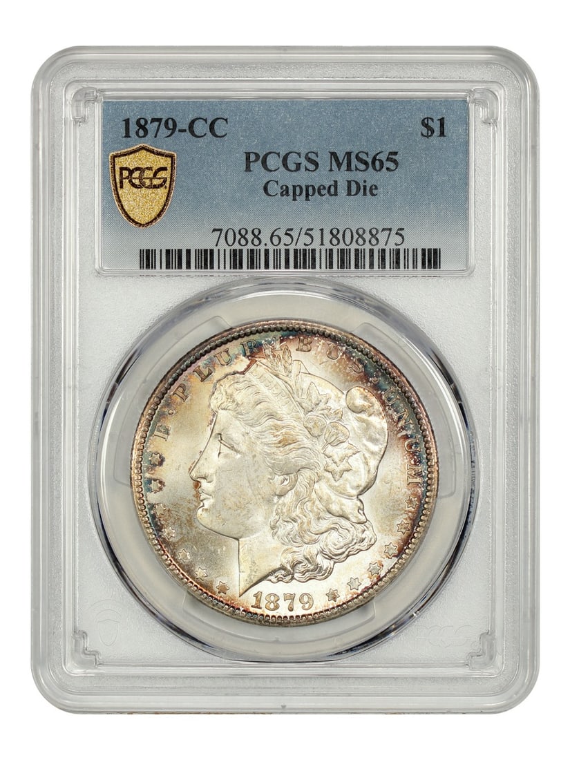 PCGS MS65 1879 Carson City Morgan Dollar Capped CC Variety Gem: PCGS MS65 1879 Carson City Morgan Dollar Capped CC Variety Gem This 1879-CC Morgan Dollar features the sought-after Capped Die variety, distinguished by raised dimples at the top of the CC mintmark. G