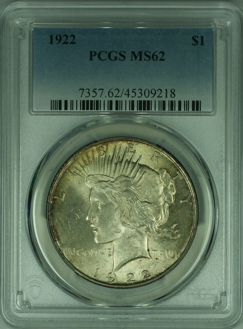 1922 Peace Dollar PCGS MS62 Silver Coin With Toning: 1922 Peace Dollar PCGS MS62 Silver Coin With Toning This 1922 Peace Silver Dollar features natural toning and is certified by PCGS with a grade of MS-62. Struck in Philadelphia, it is composed of silv