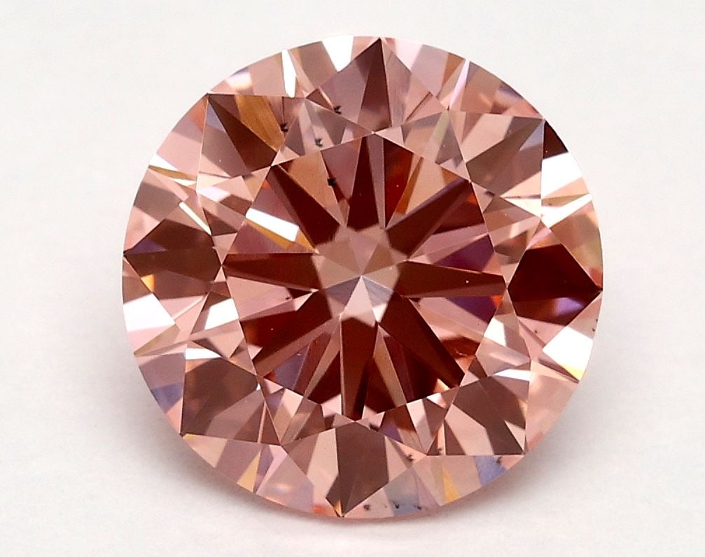 Loose Diamond - ROUND 2.13ct Fancy Vivid Pink VS2: Loose Diamond - ROUND 2.13ct Fancy Vivid Pink VS2 Source: This is a real non-mined Diamond that has been grown in a lab Shape: ROUND Carats: 2.13 Color: Fancy Vivid Pink Certification: IGI Video: