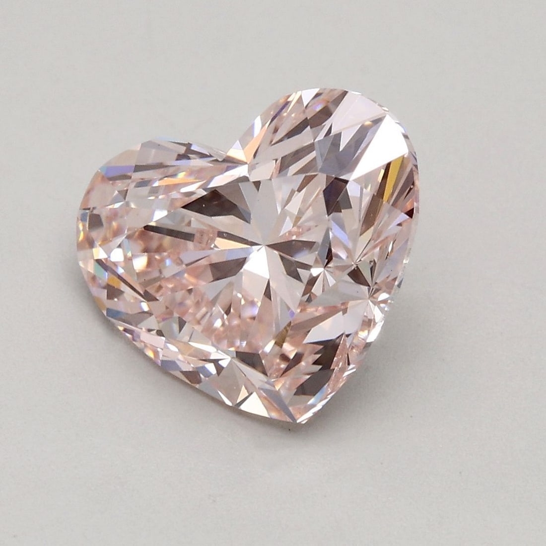 Loose Diamond - HEART 2.35ct Fancy Pink VS1: Loose Diamond - HEART 2.35ct Fancy Pink VS1 Source: This is a real non-mined Diamond that has been grown in a lab Shape: HEART Carats: 2.35 Color: Fancy Pink Certification: IGI Video: