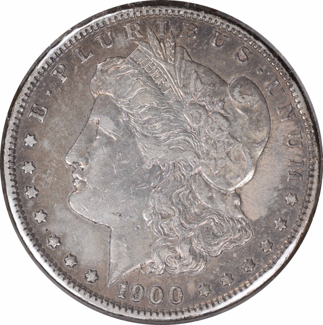 1900-O Morgan Silver Dollar Uncertified Coin by George T. Morgan: 1900-O Morgan Silver Dollar Uncertified Coin by George T. Morgan This 1900-O/CC Morgan Silver Dollar showcases the craftsmanship of renowned designer George T. Morgan. Struck in 90% silver and 10% cop