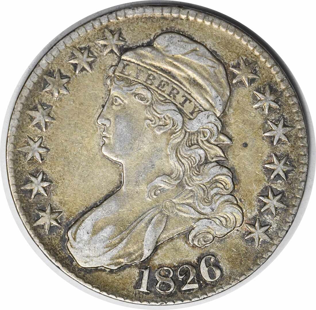 1826 Bust Half Dollar AU John Reich Design Philadelphia Mint: 1826 Bust Half Dollar AU John Reich Design Philadelphia Mint This 1826 Bust Half Dollar showcases the artistry of designer John Reich, featuring a classic design that commemorates American history. Mi