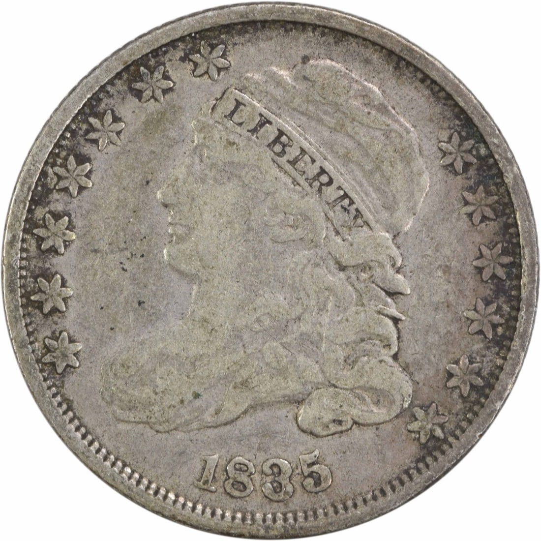 1835 Capped Bust Silver Dime 10C Uncertified Philadelphia Mint: 1835 Capped Bust Silver Dime 10C Uncertified Philadelphia Mint This 1835 Capped Bust Silver Dime features a classic design by John Reich and has been circulated, bearing the marks of its history. Stru