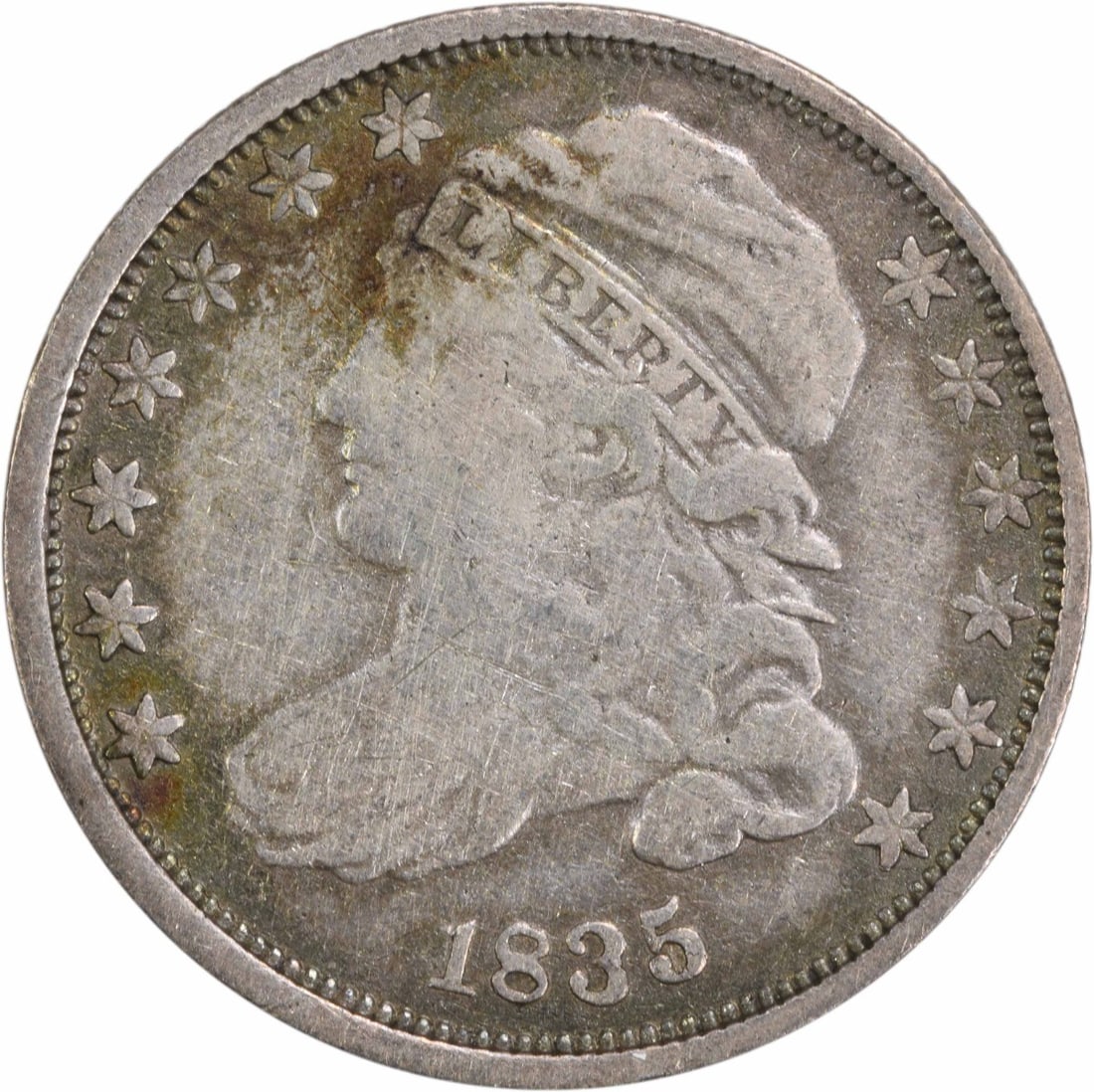 1835 Capped Bust Silver Dime 10C Uncertified Philadelphia Mint: 1835 Capped Bust Silver Dime 10C Uncertified Philadelphia Mint This 1835 Capped Bust Silver Dime is a remarkable piece for collectors. Struck in Philadelphia, this coin features a composition of 89.2%