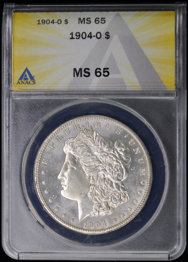 1904-O Morgan Dollar ANACS MS65 Uncirculated Coin: 1904-O Morgan Dollar ANACS MS65 Uncirculated Coin This 1904-O Morgan Dollar is a remarkable piece of numismatic history, certified by ANACS with a grade of MS65, indicating its uncirculated condition.