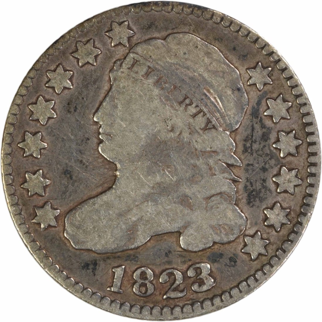 Capped Bust 1823 Over 2 Dime Philadelphia Silver Circulated F Grade: Capped Bust 1823 Over 2 Dime Philadelphia Silver Circulated F Grade This is an 1823/2 Capped Bust silver dime, graded F (Fine) and classified as circulated. Designed by John Reich and minted in Philad