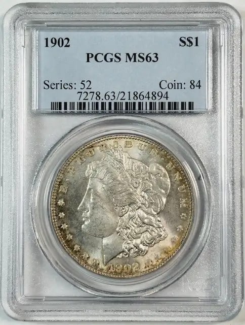 1902 P Morgan Silver Dollar Certified PCGS MS63 Uncirculated: 1902 P Morgan Silver Dollar Certified PCGS MS63 Uncirculated This 1902 P Morgan Silver Dollar is a remarkable piece, certified by PCGS with a grade of MS 63. Struck in Philadelphia, this uncirculated 