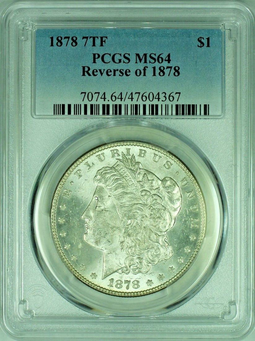 PCGS MS64 1878 Morgan Dollar 7 Tail Feathers Silver $1 Coin: PCGS MS64 1878 Morgan Dollar 7 Tail Feathers Silver $1 Coin This is an 1878 7 Tail Feathers Morgan Silver Dollar graded MS 64 by PCGS. The coin is uncirculated and composed of silver. It is a $1 denom