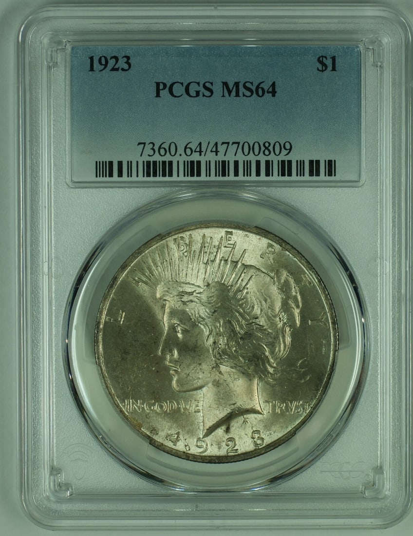 PCGS MS 64 1923 Peace Silver Dollar Toned United States Coin: PCGS MS 64 1923 Peace Silver Dollar Toned United States Coin This is a 1923 Peace Silver Dollar coin from the United States, featuring a toned appearance. The coin is composed of silver, has a denomin