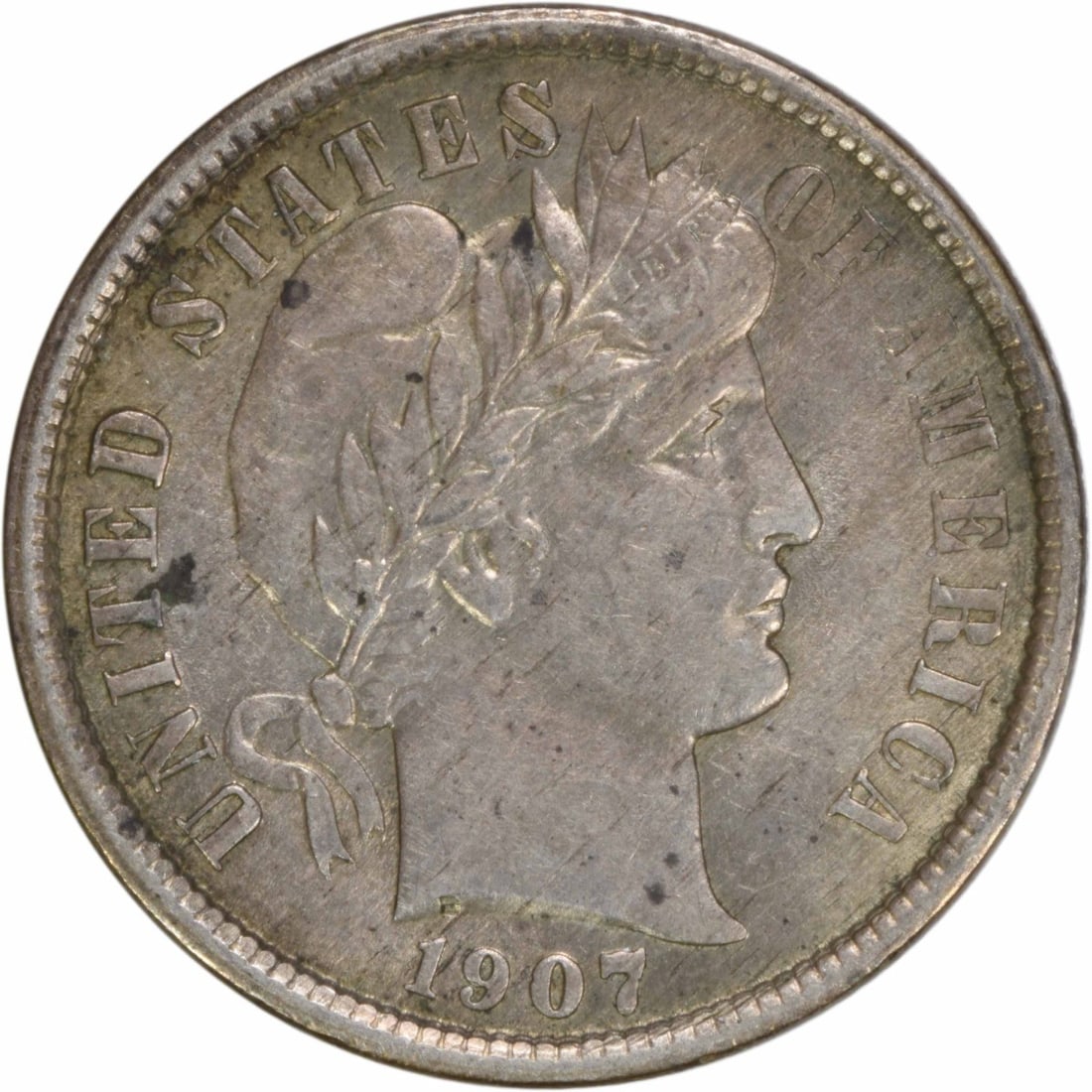 1907 Barber Silver Dime 90% Silver AU Uncertified Philadelphia: 1907 Barber Silver Dime 90% Silver AU Uncertified Philadelphia This 1907 Barber Silver Dime is a beautiful representation of American coinage. It features a design by Charles E. Barber, showcasing the