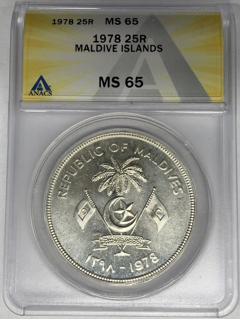 1978 Maldives 25 Rupees Coin ANACS MS 65 Certified: 1978 Maldives 25 Rupees Coin ANACS MS 65 Certified This 1978 Maldive Islands 25 Rupee coin is certified by ANACS with a grade of MS 65. It is a pre-owned collectible coin from the Maldives, featuring 