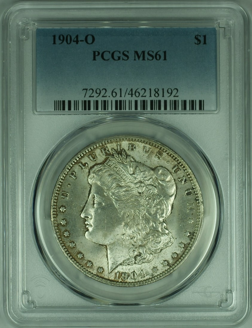 PCGS MS-61 1904-O Morgan Dollar Silver Coin from New Orleans Mint: PCGS MS-61 1904-O Morgan Dollar Silver Coin from New Orleans Mint This is a 1904-O Morgan Silver Dollar coin, graded MS-61 by PCGS. Minted in New Orleans, this uncirculated $1 coin features a fineness