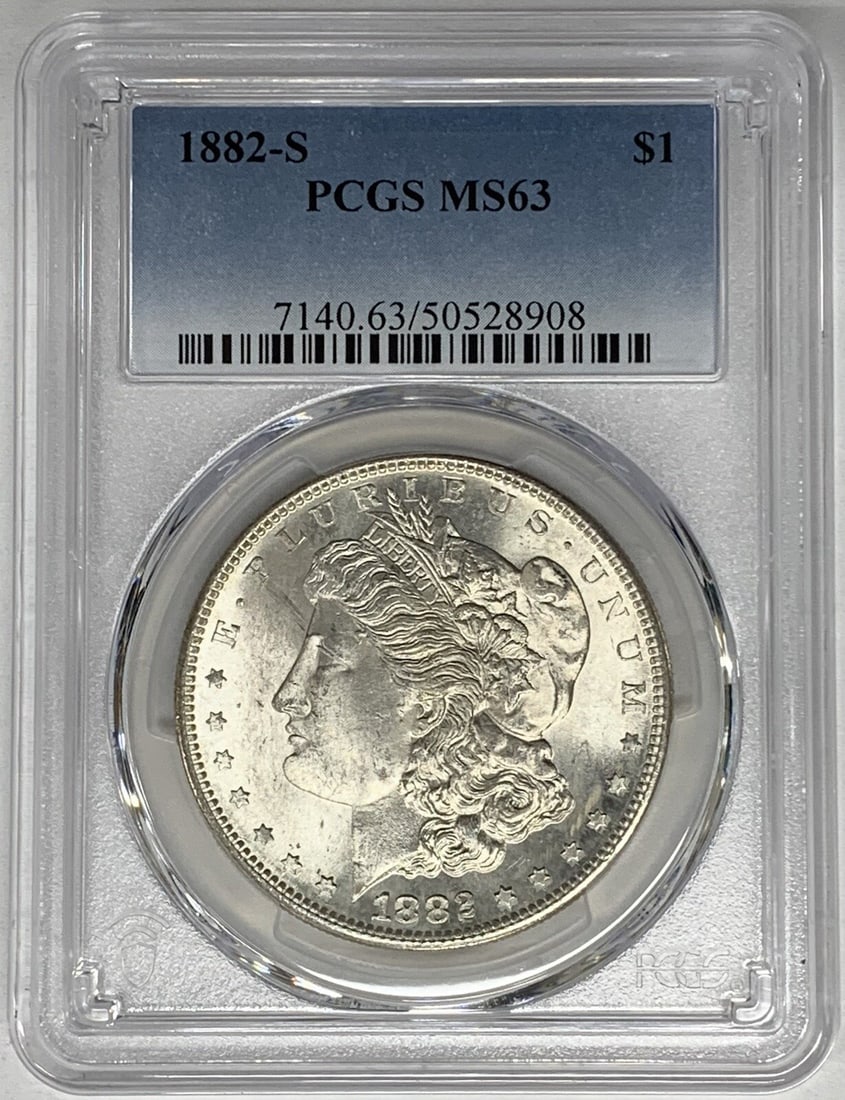 PCGS MS 63 1882-S Silver Morgan Dollar Certified Uncirculated Coin: PCGS MS 63 1882-S Silver Morgan Dollar Certified Uncirculated Coin This is an 1882-S Morgan Silver Dollar graded MS 63 by PCGS. The coin is composed of silver, has a denomination of $1, and is uncircu