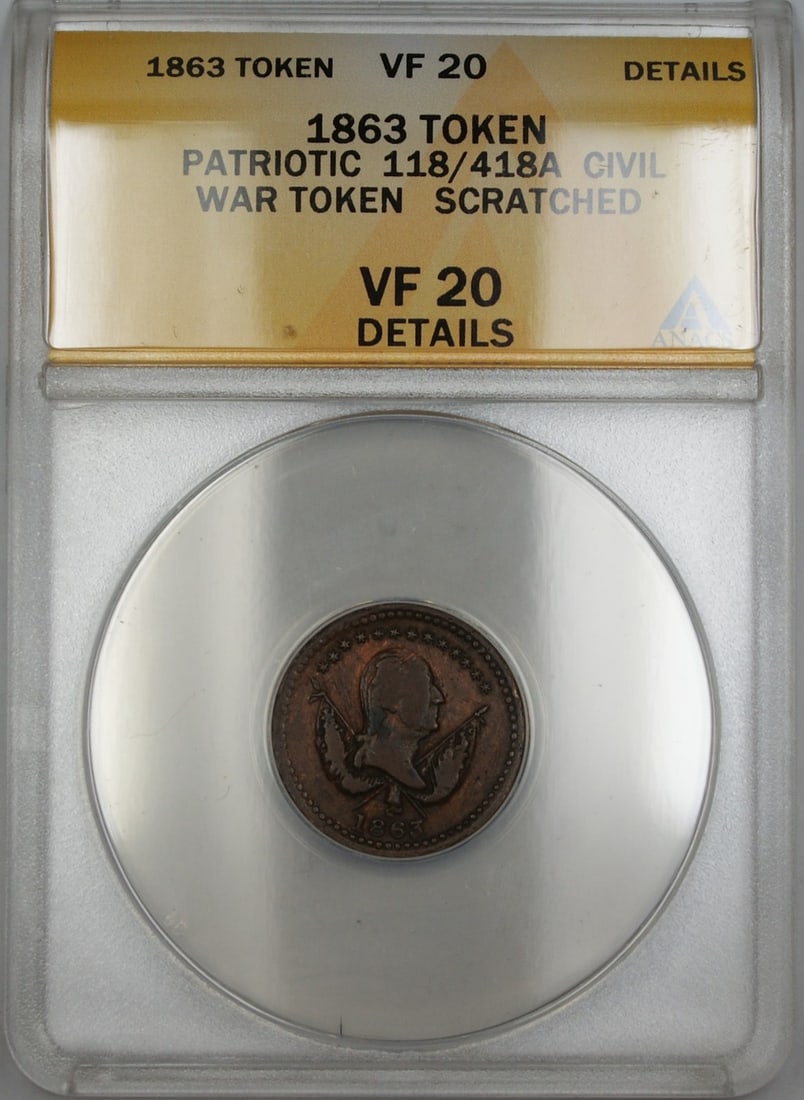 1863 United States Civil War Patriotic Token ANACS VF-20 Details 118/418a: 1863 United States Civil War Patriotic Token ANACS VF-20 Details 118/418a This 1863 Civil War Patriotic Token, cataloged as 118/418a, is from the United States and has been certified by ANACS with a g