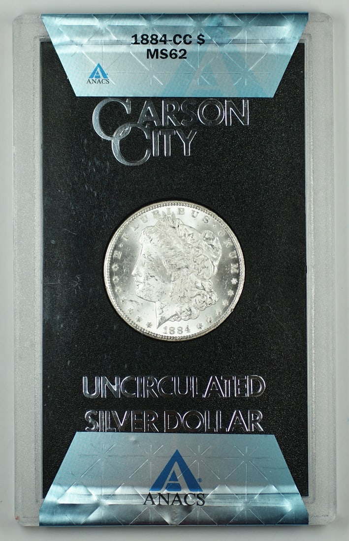 ANACS MS62 1884 Carson City Morgan Dollar with GSA Box and Certificate: ANACS MS62 1884 Carson City Morgan Dollar with GSA Box and Certificate This 1884-CC Morgan Silver Dollar is ANACS certified with an MS-62 grade and comes from the Carson City Mint. The coin is uncircu