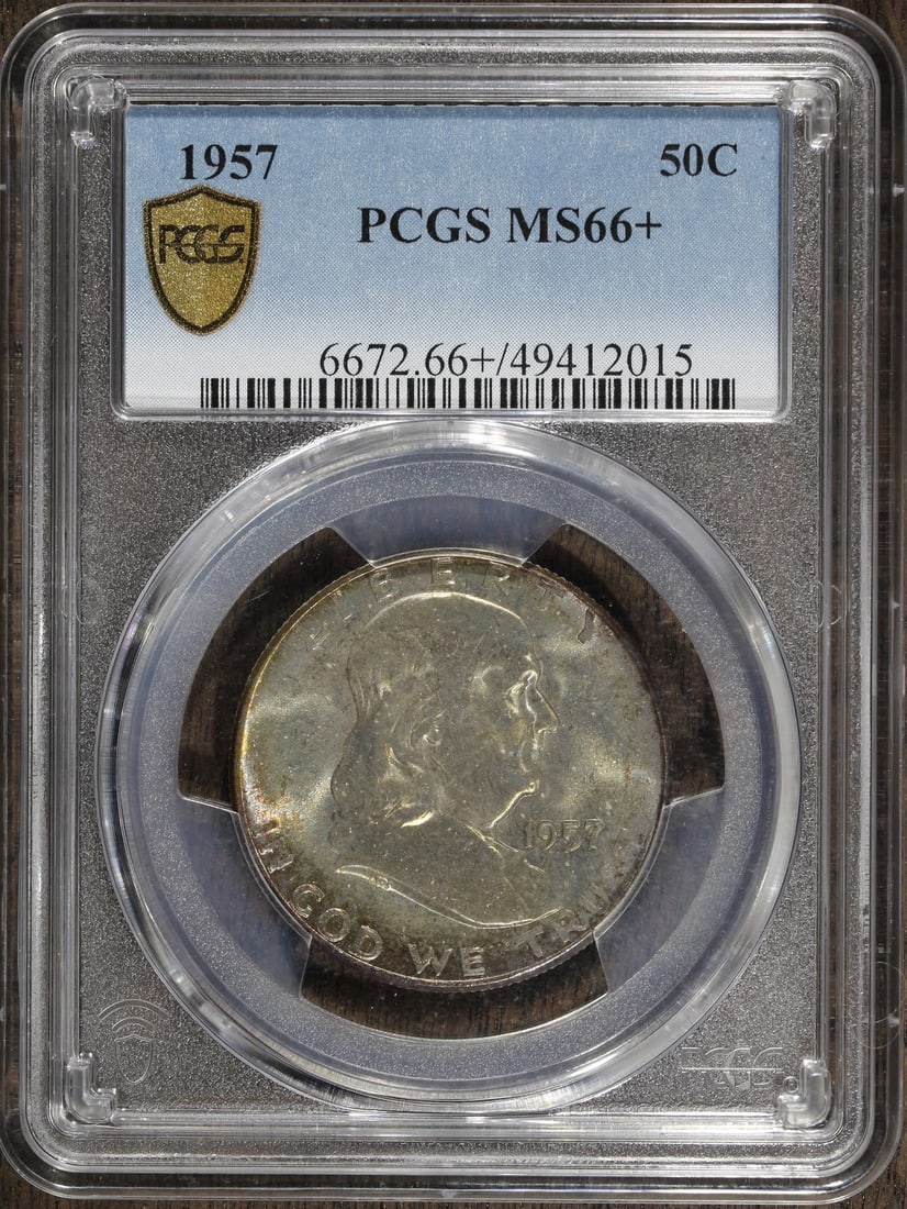 1957 Franklin Half Dollar 50C MS66+ PCGS Colorful Toning: 1957 Franklin Half Dollar 50C MS66+ PCGS Colorful Toning This stunning 1957 Franklin Half Dollar features vibrant and colorful toning, showcasing its uncirculated condition. Graded MS66 by PCGS, this 