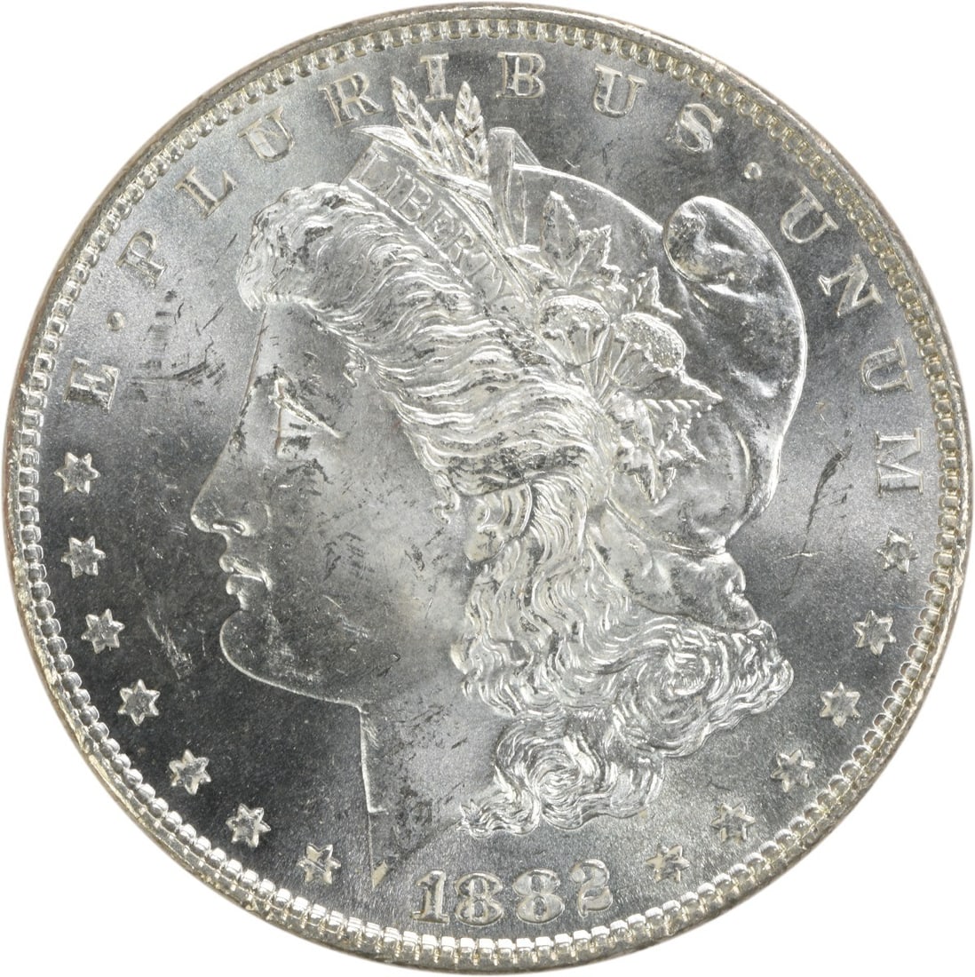 Uncirculated 1882 Silver Dollar Morgan Type No Mint Mark BU Grade: Uncirculated 1882 Silver Dollar Morgan Type No Mint Mark BU Grade This is an 1882 Morgan Silver Dollar from the United States. The coin is uncirculated and in brilliant uncirculated (BU) condition. It