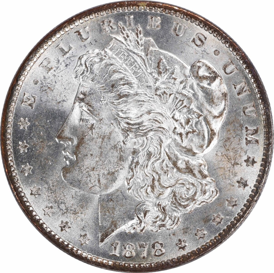 1878 Silver Dollar Morgan Coin 7 Tail Feathers Reverse 1879 BU Uncirculated: 1878 Silver Dollar Morgan Coin 7 Tail Feathers Reverse 1879 BU Uncirculated This is a pre-owned 1878 Morgan Silver Dollar featuring the 7 Tail Feathers Reverse of 1879 variety. The coin is uncirculate