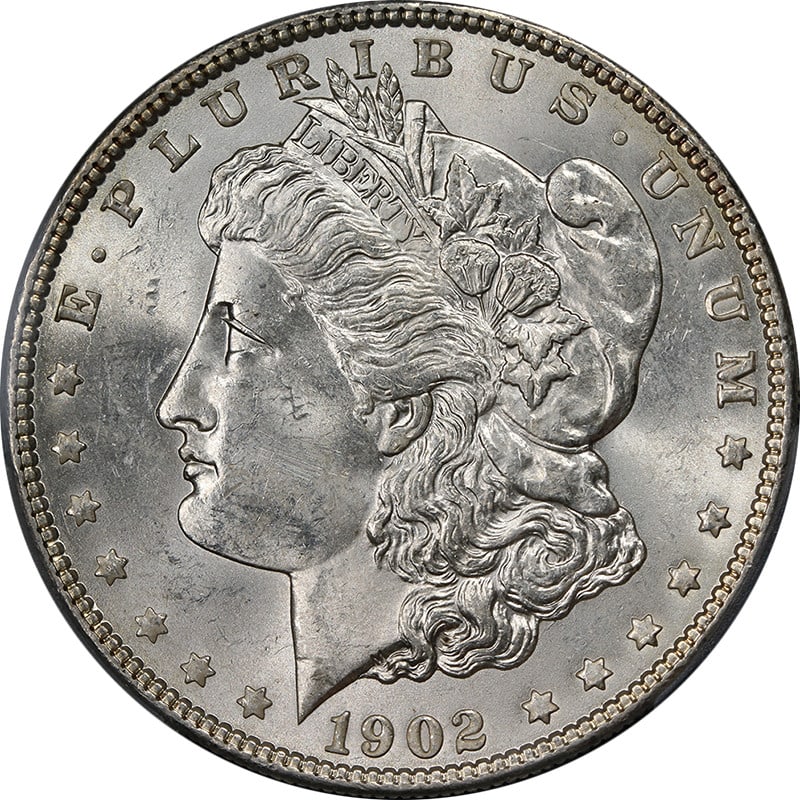 PCGS MS64 1902-P Morgan Dollar Uncirculated Silver Coin: PCGS MS64 1902-P Morgan Dollar Uncirculated Silver Coin This stunning 1902-P Morgan Silver Dollar features exceptional eye appeal, showcasing fantastic luster and a nice strike. The coin is bright whi